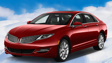 red lincoln sedan in the snow