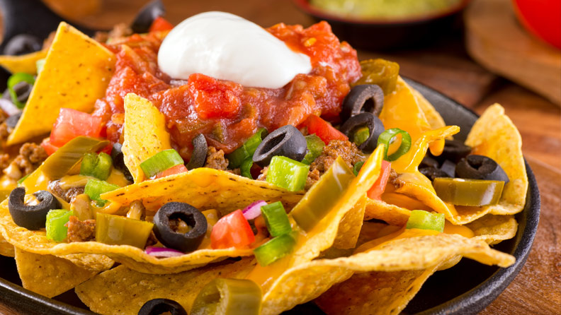 nachos grande with jalapeno, salsa, black olives and sour cream